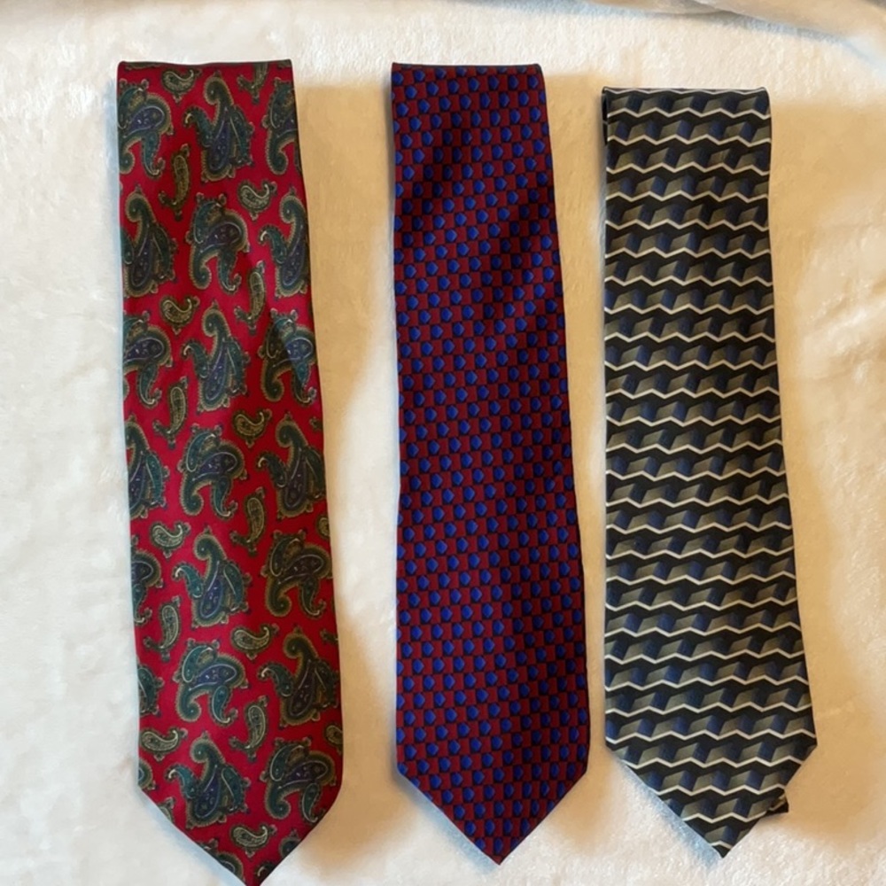 Various brands set of three 100% silk ties.